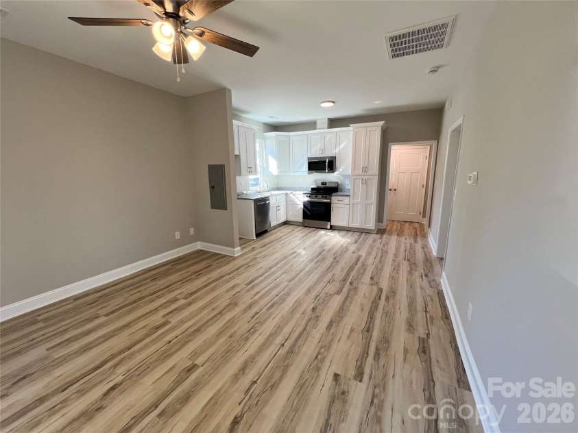 722 Austin Street, Albemarle, NC 28001.  MLS# CAR4343911, YatesRealty ID 9035. Living Room/Kitchen