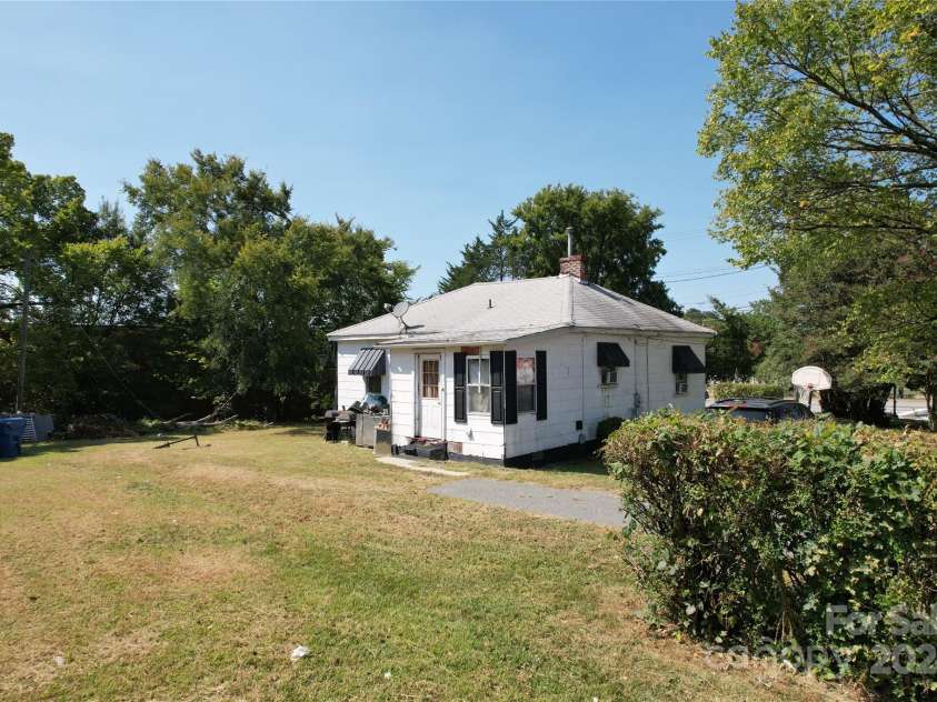 110 Sims Parkway, Harrisburg, NC 28075.  MLS# CAR4179263, YatesRealty ID 9037. Rearview of subject property