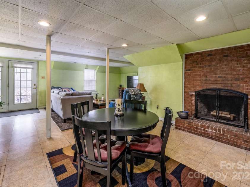166 Rosalind Lane, Statesville, NC 28677.  MLS# CAR4114353, YatesRealty ID 9038. Dining Area w/Brick Fireplace