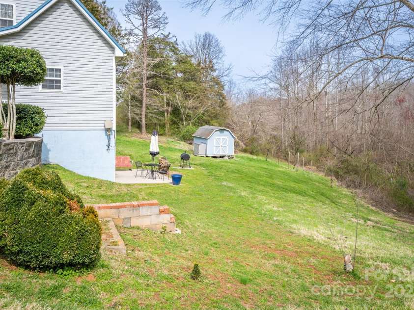 166 Rosalind Lane, Statesville, NC 28677.  MLS# CAR4114353, YatesRealty ID 9038. Side Yard
