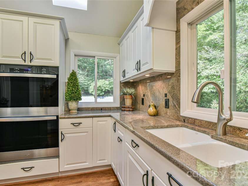 409 North Fork Road, Black Mountain, NC 28711.  MLS# CAR4284708, YatesRealty ID 904. Abundant natural light from large windows and skylights. 