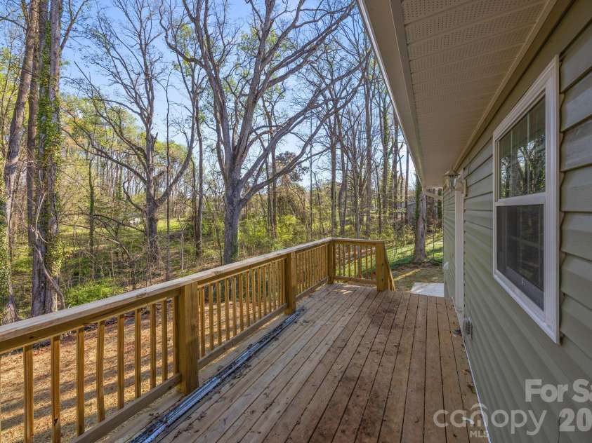 1700 Bringle Ferry Road, Salisbury, NC 28146.  MLS# CAR4342002, YatesRealty ID 9043. Large 20'x8' Deck for entertaining or relaxing