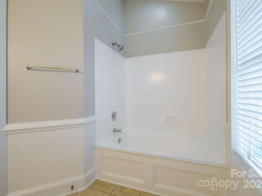 6007 Kenmore Lane, Indian Trail, NC 28079.  MLS# CAR4251243, YatesRealty ID 9044. Primary bathroom