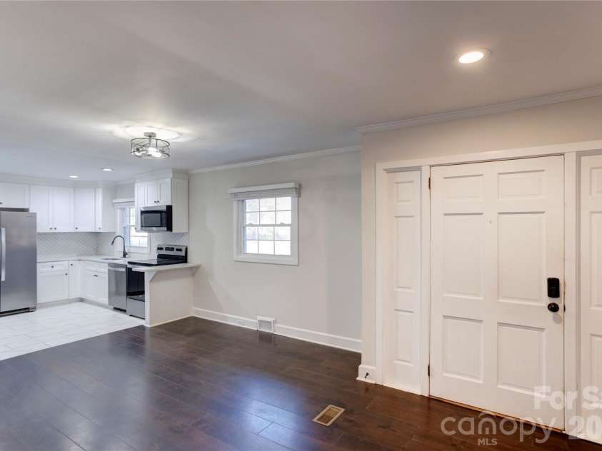 782 Union Street, Concord, NC 28025.  MLS# CAR4392683, YatesRealty ID 9044. Entryway, dining area and kitchen. 