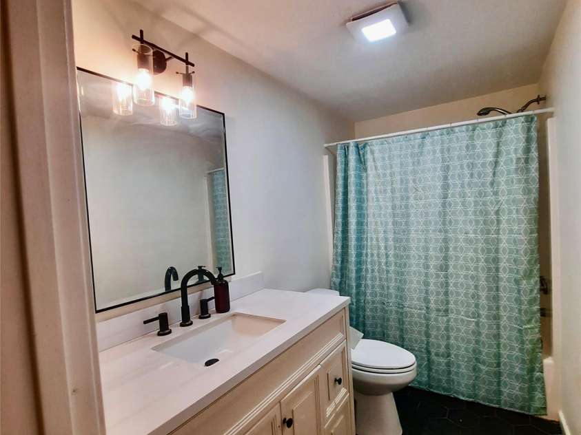 119 Grant Lane, Saluda, NC 28773.  MLS# CAR4360220, YatesRealty ID 9048. Hall bath