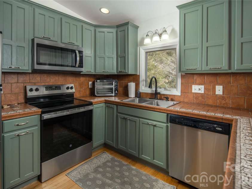 1628 Skyland Drive, Seven Devils, NC 28604.  MLS# CAR4346493, YatesRealty ID 9049. 