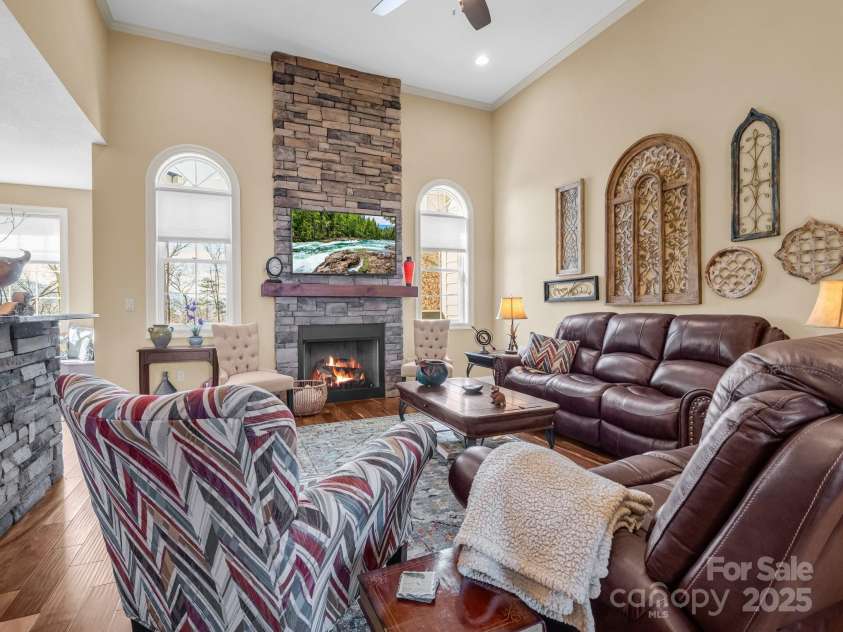 735 Bills Mountain Trail, Lake Lure, NC 28746.  MLS# CAR4190654, YatesRealty ID 905. Cathedral LR w FP