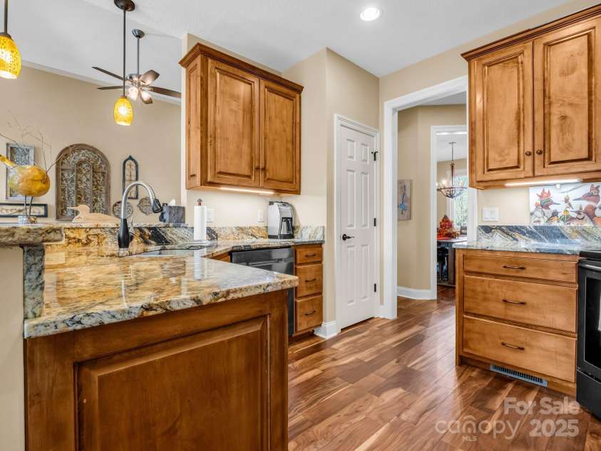 735 Bills Mountain Trail, Lake Lure, NC 28746.  MLS# CAR4190654, YatesRealty ID 905. Granite kitchen