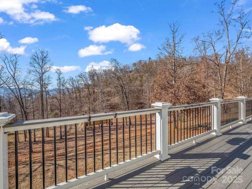 735 Bills Mountain Trail, Lake Lure, NC 28746.  MLS# CAR4190654, YatesRealty ID 905. Rear deck