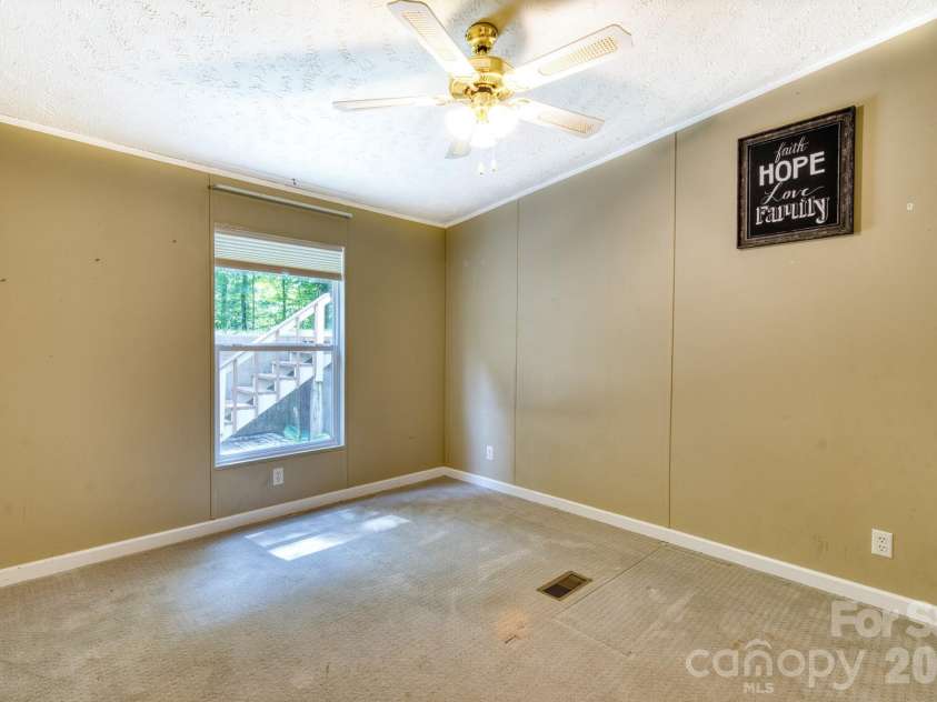 18 Henry White Lane, Leicester, NC 28748.  MLS# CAR4419769, YatesRealty ID 9050. 