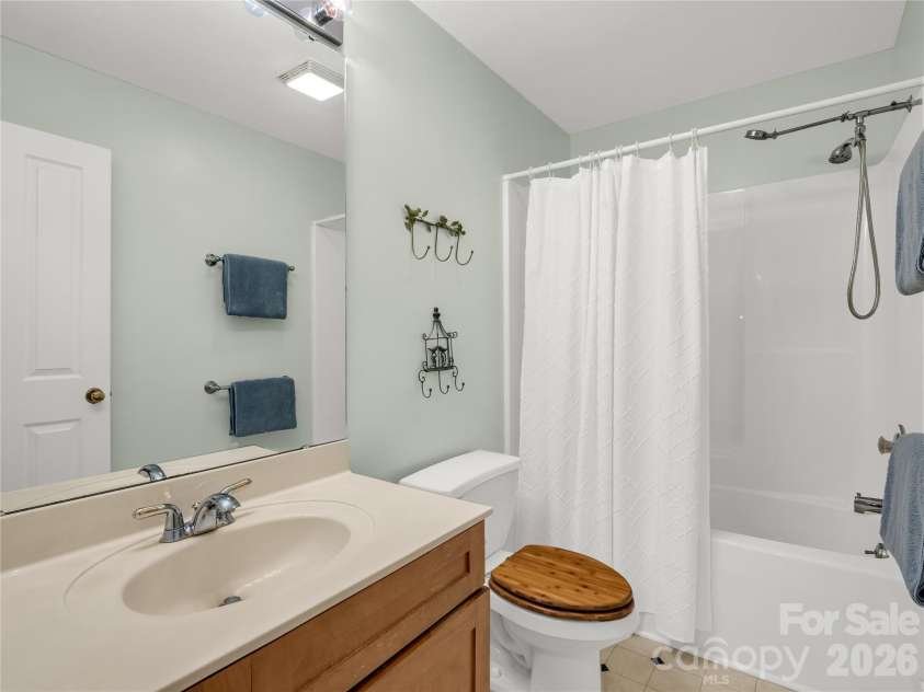 142 Winterview Trail, Hendersonville, NC 28739.  MLS# CAR4300750, YatesRealty ID 9056. Guest bathroom 