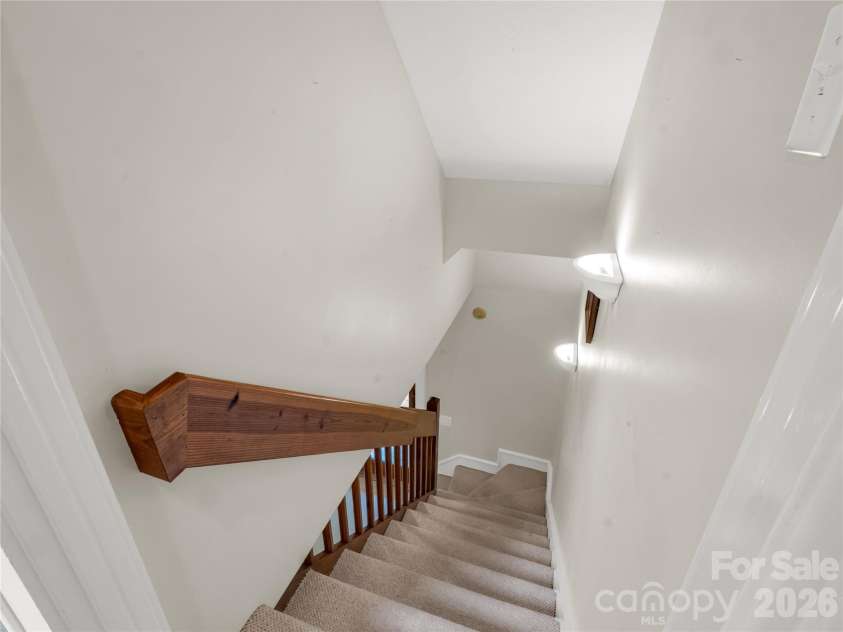 142 Winterview Trail, Hendersonville, NC 28739.  MLS# CAR4300750, YatesRealty ID 9056. Hallway to basement 