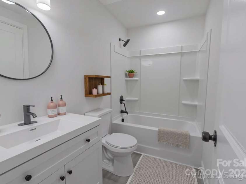 116 11th Street, Spencer, NC 28159.  MLS# CAR4228313, YatesRealty ID 9058. 2nd Bathroom Staged