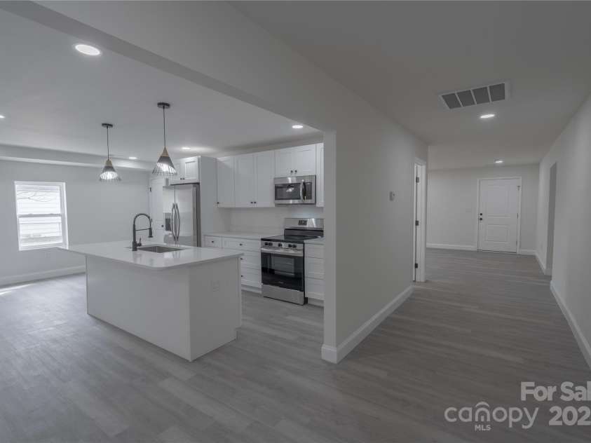 116 11th Street, Spencer, NC 28159.  MLS# CAR4228313, YatesRealty ID 9058. Hallway/Kitchen