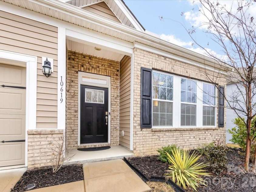 10619 Carver Falls Road, Charlotte, NC 28214.  MLS# CAR4346346, YatesRealty ID 9059. Beautiful covered front entry with partial brick facade.