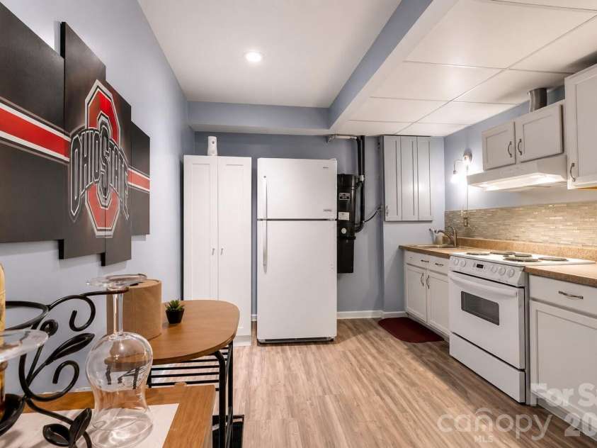 97 Ballantree Drive, Asheville, NC 28803.  MLS# CAR4231911, YatesRealty ID 9063. A complete second kitchen downstairs