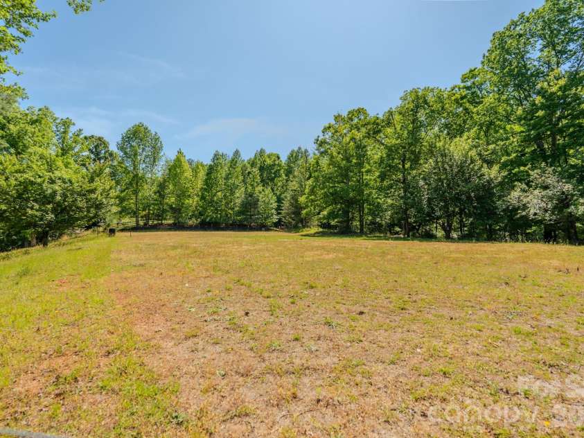 777 River Road, Tryon, NC 28782.  MLS# CAR4377505, YatesRealty ID 9066. 