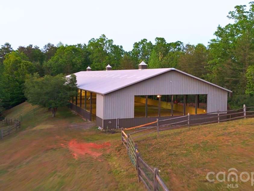 777 River Road, Tryon, NC 28782.  MLS# CAR4377505, YatesRealty ID 9066. 