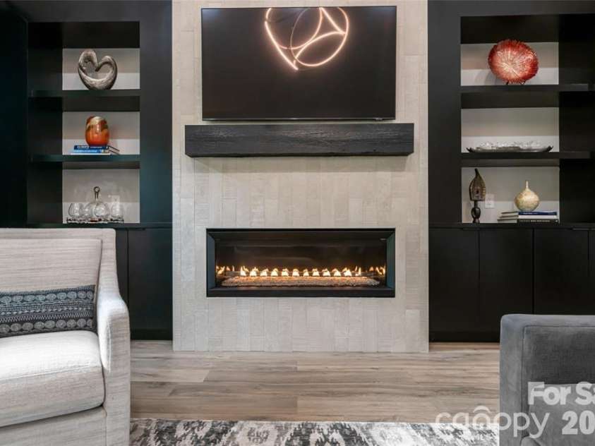 99 Timber Ridge Circle, Leicester, NC 28748.  MLS# CAR4364213, YatesRealty ID 9071. A Fireplace that sets the tone for a beautiful, elevated, and relaxing experience.