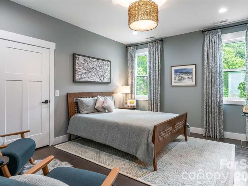 99 Timber Ridge Circle, Leicester, NC 28748.  MLS# CAR4364213, YatesRealty ID 9071. Bedroom with full private bath.