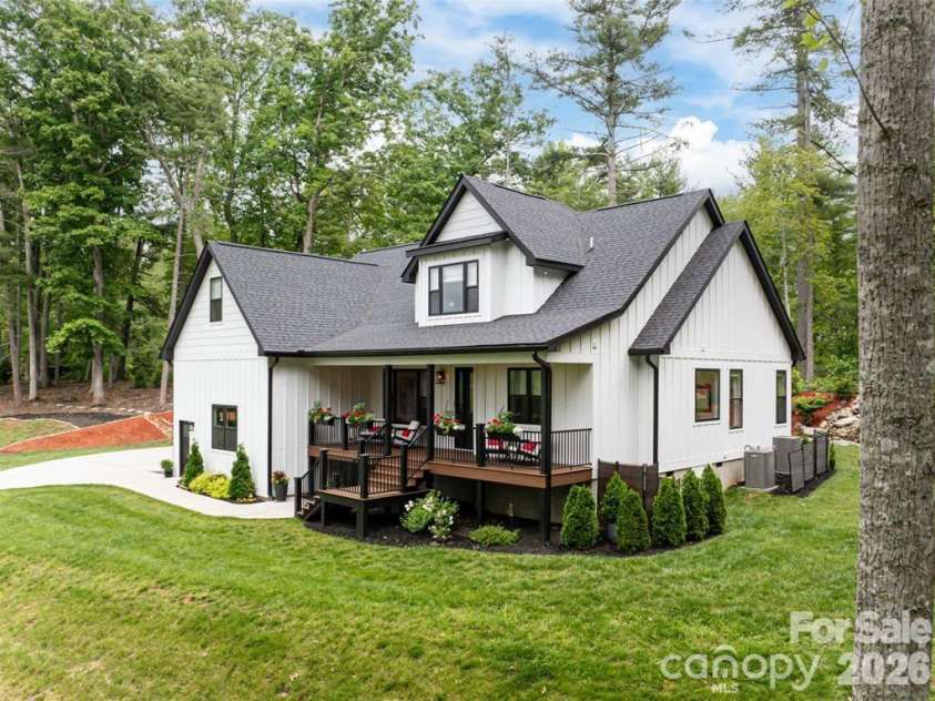 99 Timber Ridge Circle, Leicester, NC 28748.  MLS# CAR4364213, YatesRealty ID 9071. Contemporary Brilliance on a double lot for privacy.