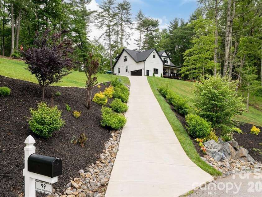 99 Timber Ridge Circle, Leicester, NC 28748.  MLS# CAR4364213, YatesRealty ID 9071. Private concrete drive.