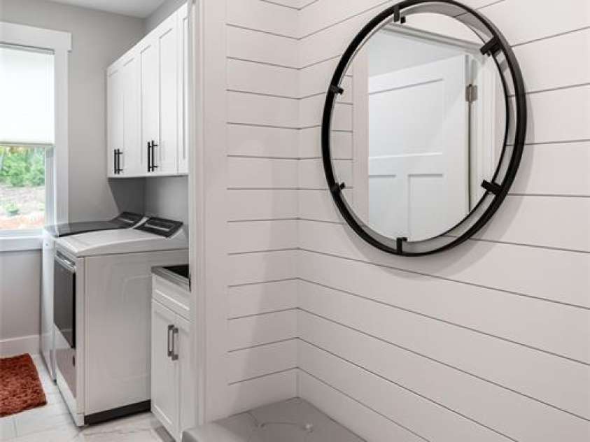 99 Timber Ridge Circle, Leicester, NC 28748.  MLS# CAR4364213, YatesRealty ID 9071. Thoughtfully designed space from the garage entrance to the Laundry room with a large laundry sink.