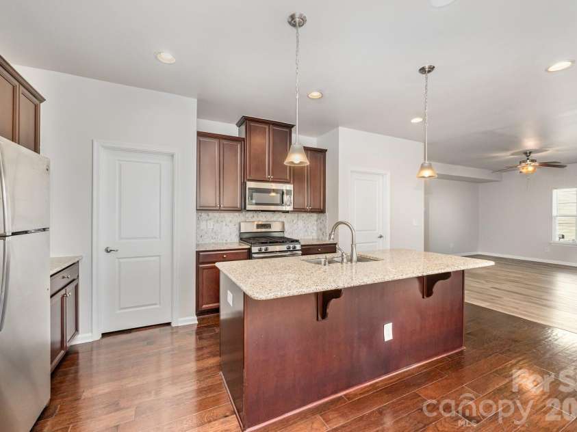 1210 Longwall Lane, Matthews, NC 28104.  MLS# CAR4329128, YatesRealty ID 9076. 