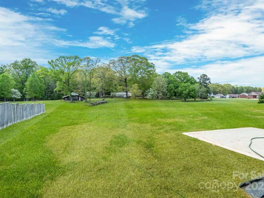 544 Church Street, Locust, NC 28097.  MLS# CAR4244517, YatesRealty ID 9076. 