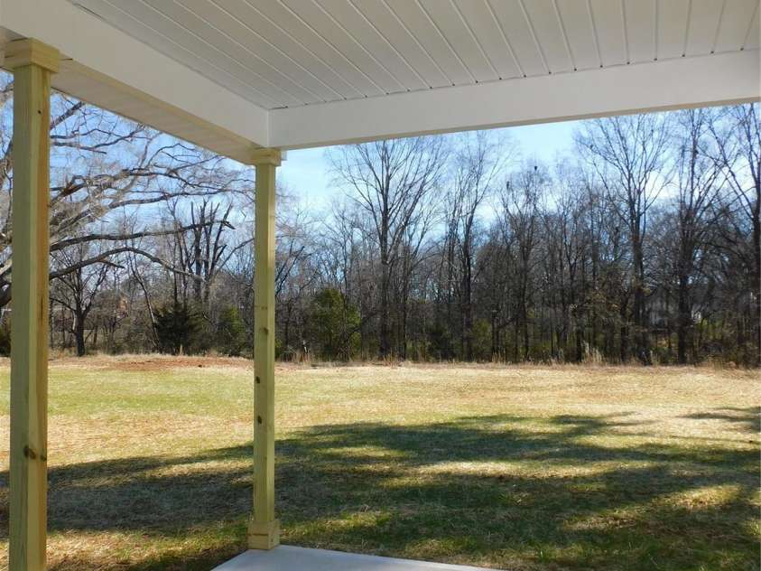 216 McClain Street, York, SC 29745.  MLS# CAR4325786, YatesRealty ID 9087. Covered patio view