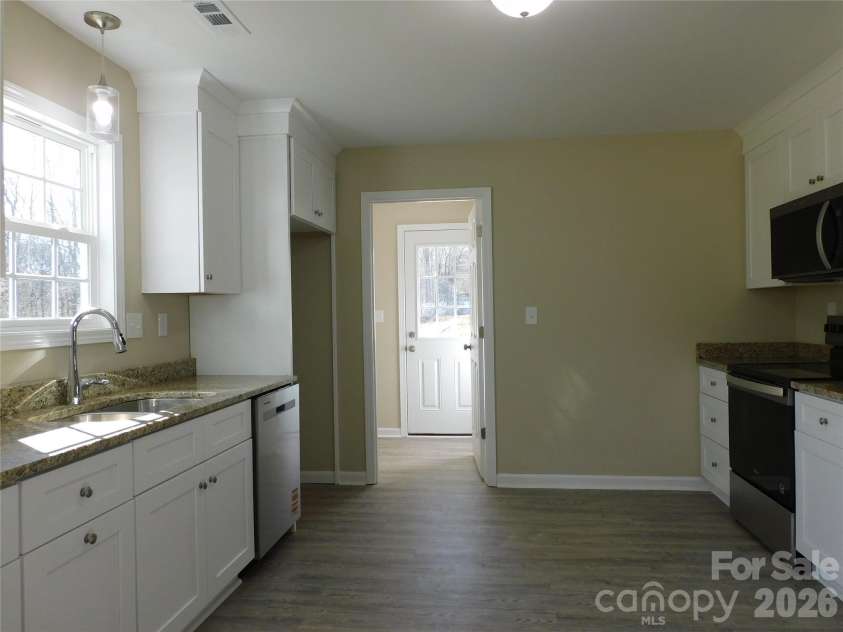 216 McClain Street, York, SC 29745.  MLS# CAR4325786, YatesRealty ID 9087. Kitchen to Mudroom with pantry