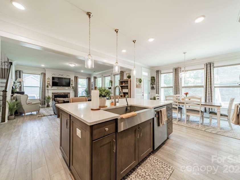 849 Yucatan Drive, Waxhaw, NC 28173.  MLS# CAR4281453, YatesRealty ID 909. Kitchen w/ Dining & living room