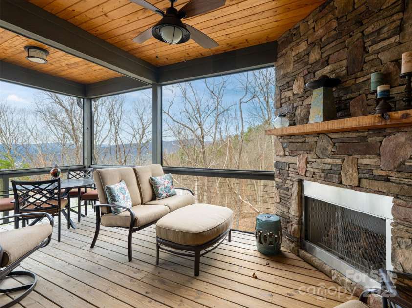21 Alta Citta Lane, Asheville, NC 28804.  MLS# CAR4241580, YatesRealty ID 9090. Cozy up to the gas log fireplace and enjoy