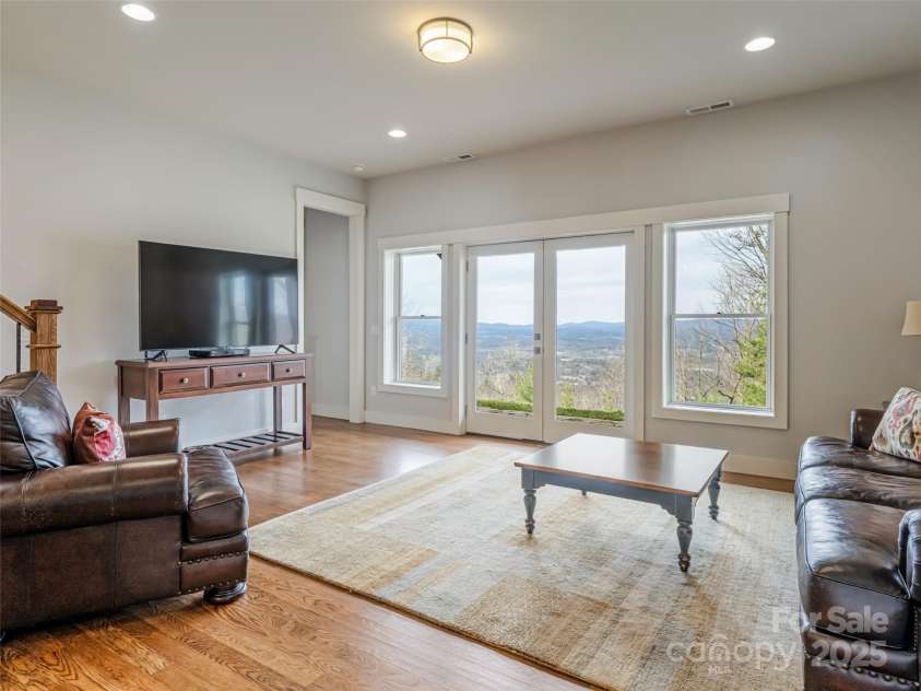 21 Alta Citta Lane, Asheville, NC 28804.  MLS# CAR4241580, YatesRealty ID 9090. Family room with views