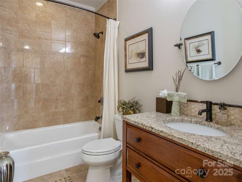 21 Alta Citta Lane, Asheville, NC 28804.  MLS# CAR4241580, YatesRealty ID 9090. Guest bath on main level