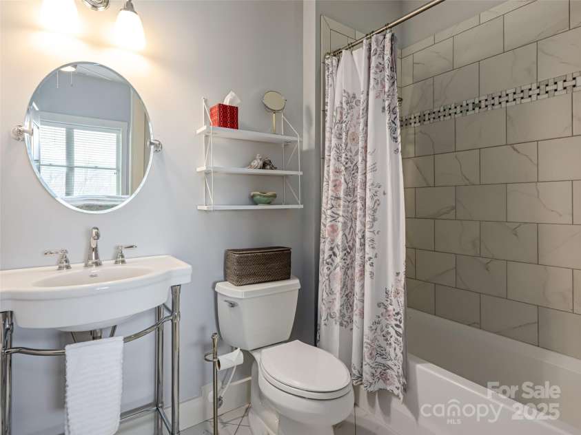 21 Alta Citta Lane, Asheville, NC 28804.  MLS# CAR4241580, YatesRealty ID 9090. One of two full bathrooms on lower level