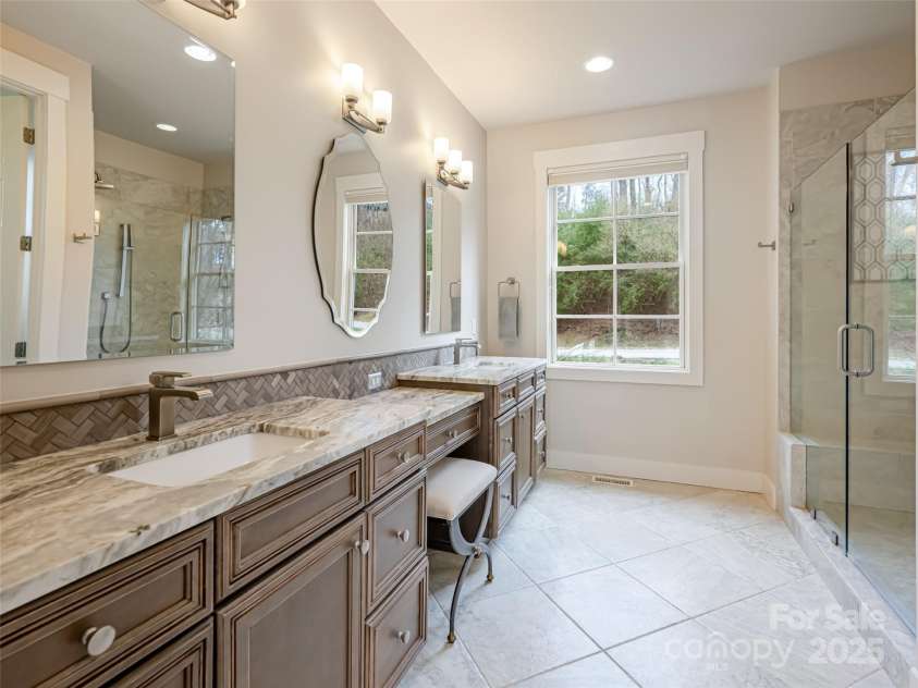 21 Alta Citta Lane, Asheville, NC 28804.  MLS# CAR4241580, YatesRealty ID 9090. Primary bathroom with step-in shower