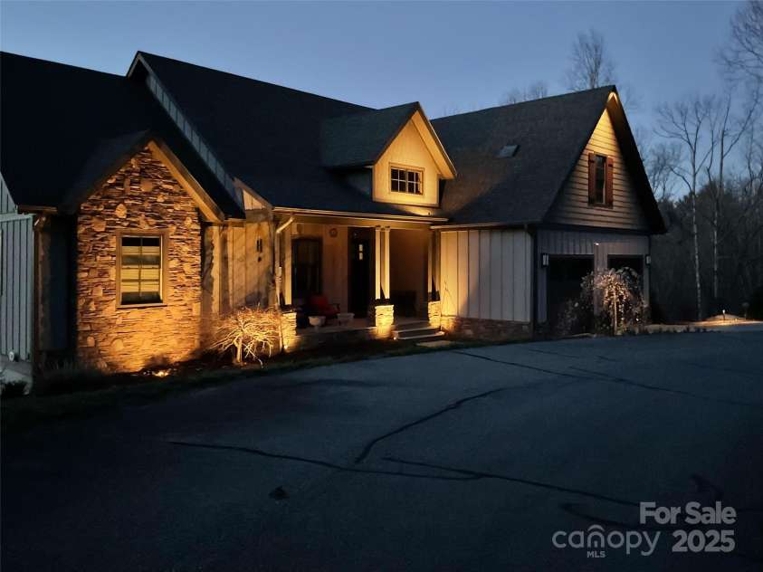 21 Alta Citta Lane, Asheville, NC 28804.  MLS# CAR4241580, YatesRealty ID 9090. Twilight with new landscaping lights