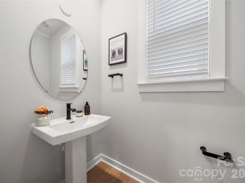 14028 Lake Home Lane, Charlotte, NC 28278.  MLS# CAR4344666, YatesRealty ID 9091. Main level half bath