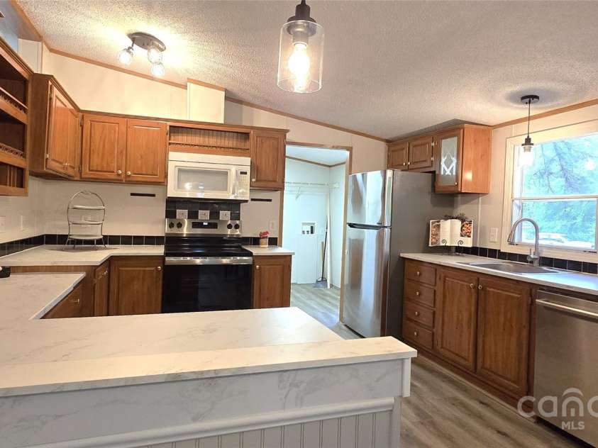 307 Aquarius Drive, Clover, SC 29710.  MLS# CAR4251663, YatesRealty ID 9095. 