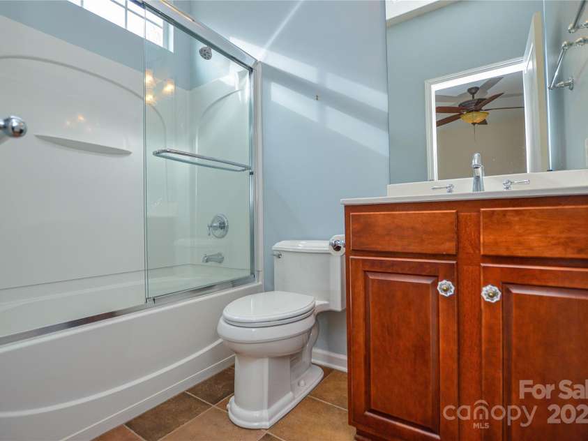 9332 Whistling Straits Drive, Fort Mill, SC 29707.  MLS# CAR4332758, YatesRealty ID 9098. 2nd bedroom ensuite bath 