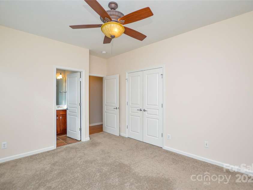 9332 Whistling Straits Drive, Fort Mill, SC 29707.  MLS# CAR4332758, YatesRealty ID 9098. Bright 2nd bedroom with its own ensuite bath