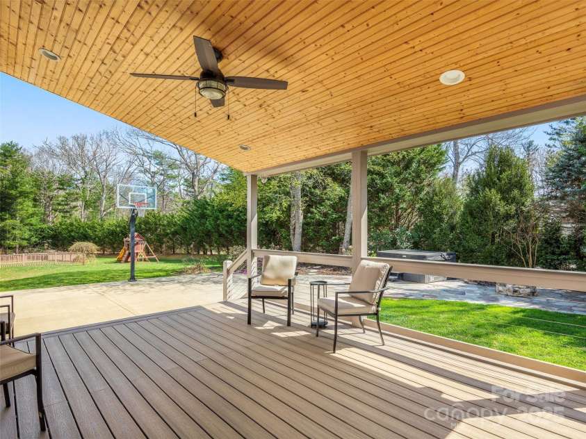 76 King Heights Drive, Fletcher, NC 28732.  MLS# CAR4245183, YatesRealty ID 9099. Covered back deck