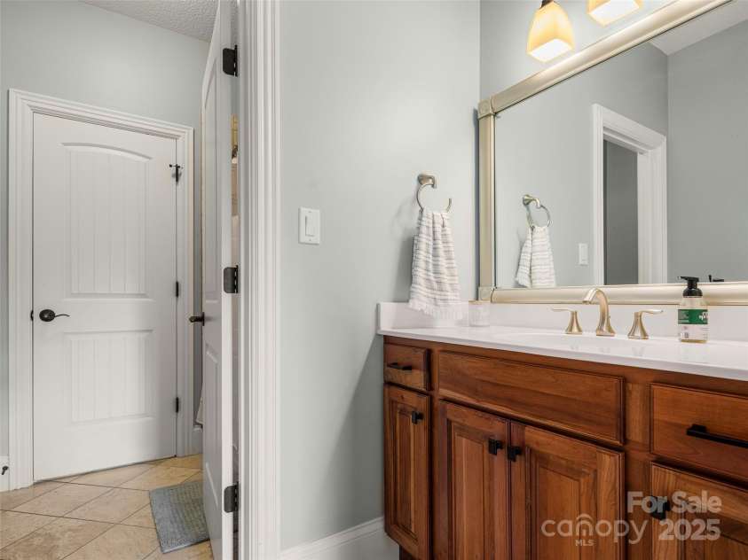 76 King Heights Drive, Fletcher, NC 28732.  MLS# CAR4245183, YatesRealty ID 9099. Upstairs bathroom