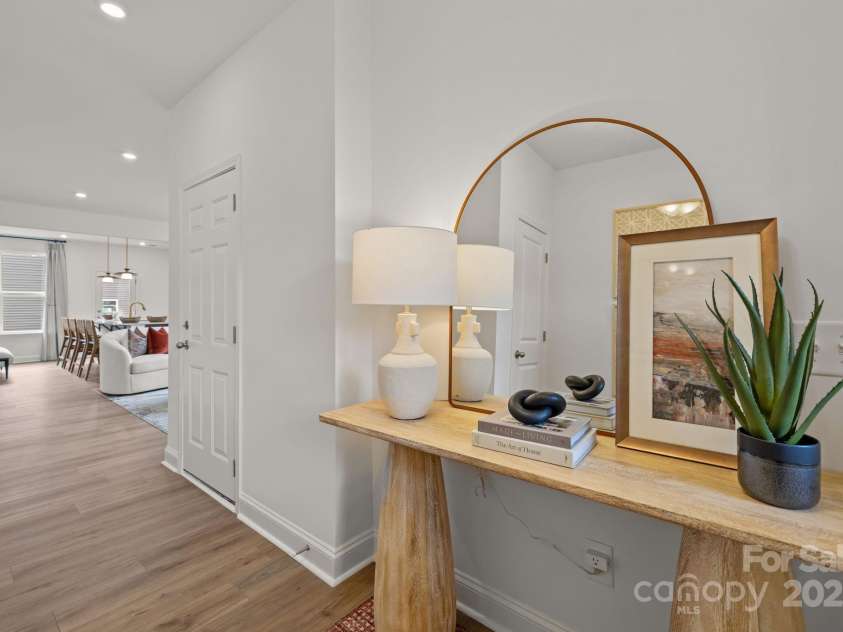 2233 Gladwyne Place, Charlotte, NC 28269.  MLS# CAR4330760, YatesRealty ID 910. Representative Photo from Model - Foyer leading into living area