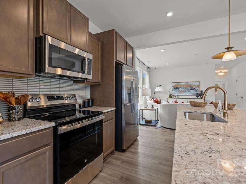 2233 Gladwyne Place, Charlotte, NC 28269.  MLS# CAR4330760, YatesRealty ID 910. Representative Photo from Model - Kitchen 