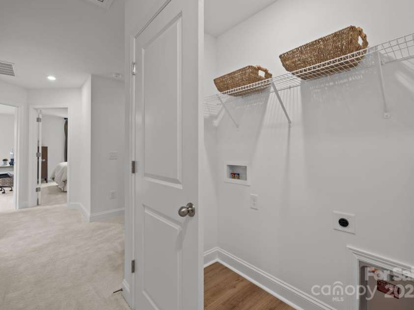 2233 Gladwyne Place, Charlotte, NC 28269.  MLS# CAR4330760, YatesRealty ID 910. Representative Photo from Model - Laundry Area