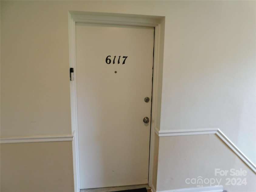 6117 Meadow Rose Lane, Charlotte, NC 28215.  MLS# CAR4173354, YatesRealty ID 910. Front door