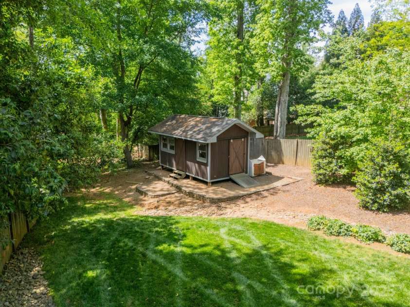 3233 Sunnymede Lane, Charlotte, NC 28209.  MLS# CAR4248507, YatesRealty ID 9100. Backyard/Shed