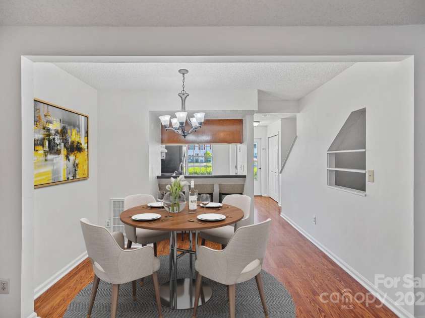 218 Water Oak Drive, Pineville, NC 28134.  MLS# CAR4269625, YatesRealty ID 9103. Dining area - virtually staged
